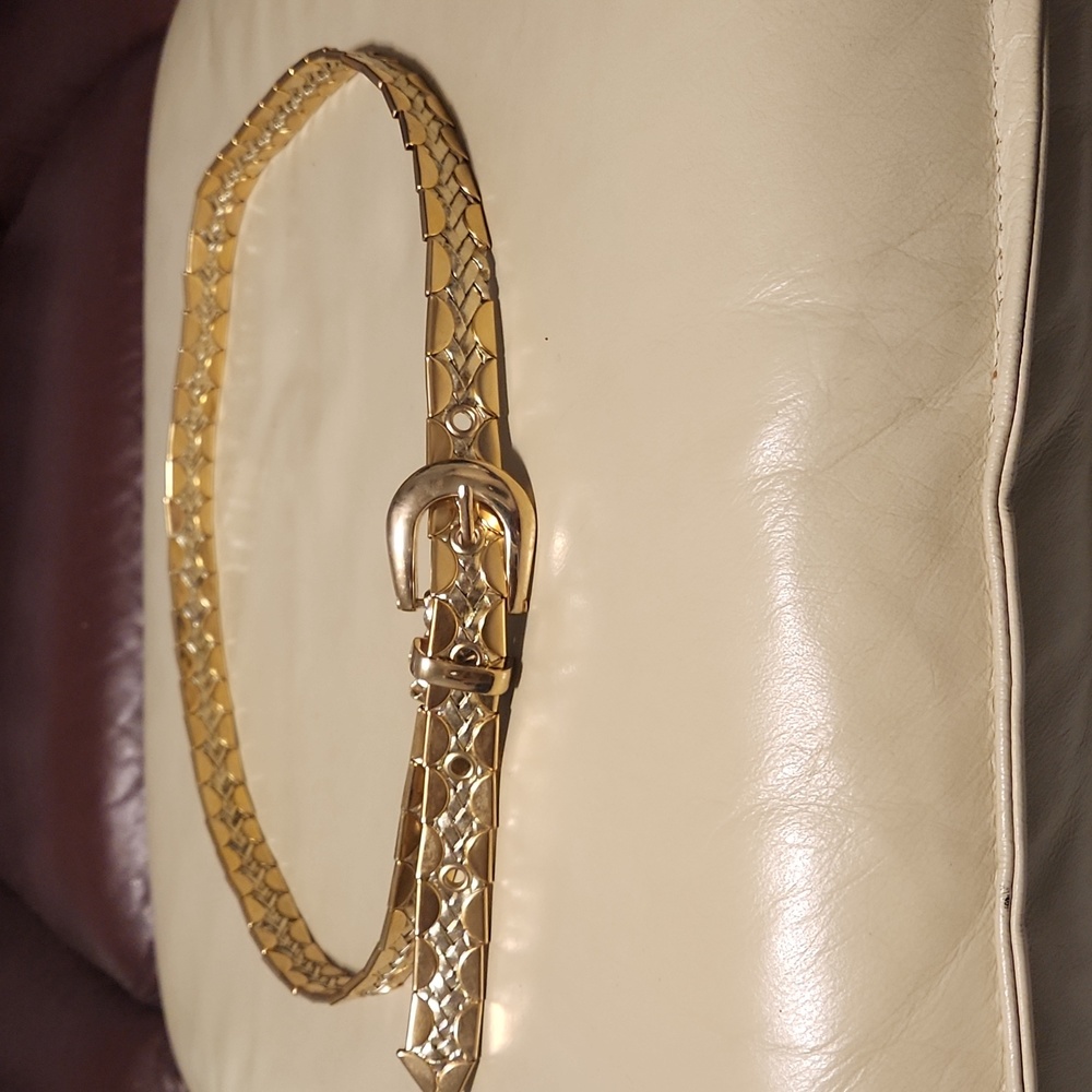 Stunning gold plated snake like belt. 48" long